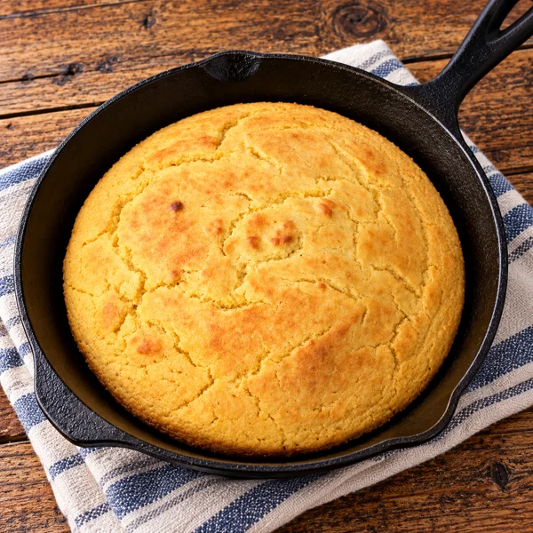 Golden Maseca cornbread in a cast-iron skillet